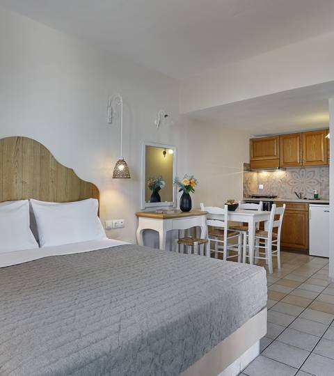 Marni Hotel Superior Studio with double bed, dining area, kitchenette, and bathroom