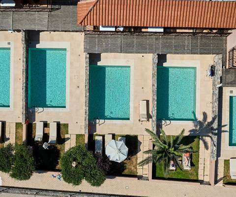 Marni Village aerial top down view of villas and suites with private terraces with pools