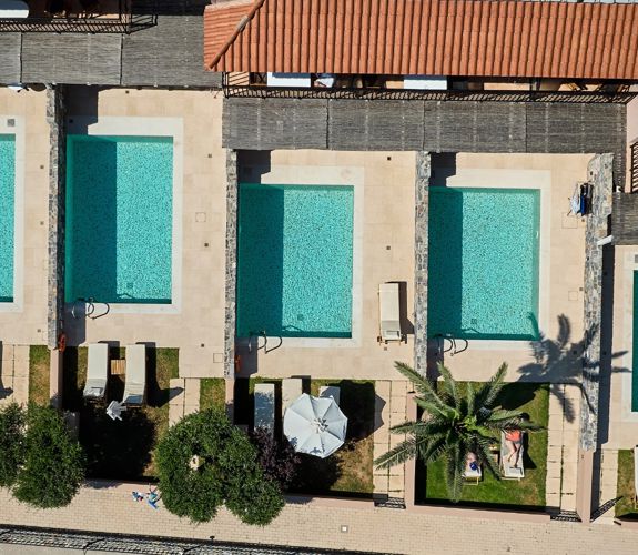 Marni Village aerial top down view of villas and suites with private terraces with pools