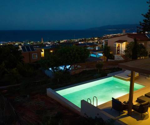 Marni Hotel Luxury Two Bedroom Villa private pool illuminated at night with sea view