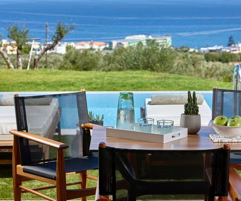 Marni Hotel Deluxe Maisonette Private Pool outdoor terrace sitting area with shadowing near the pool