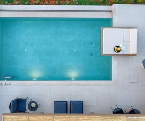 Marni Hotel Luxury Two Bedroom Villa private pool with sunbeds umbrella and lounge area