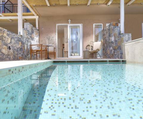 Marni Hotel Studio Private Pool outdoor area with private pool, stone walls, bamboo pergola and furnished patio