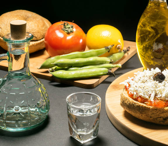 Village Koutouloufari cretan dakos with raki, olive oil, tomato, beans and lemon