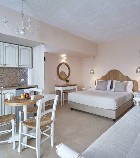 Marni Hotel Studio Private Pool open-plan layout with bed, sofa, kitchenette and dining area