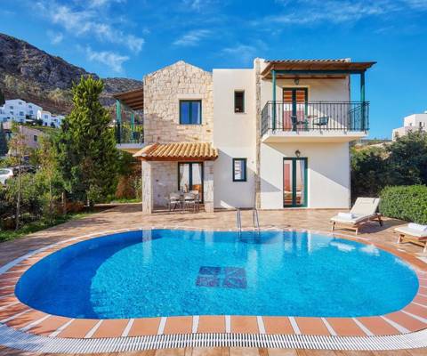 Marni Hotel Villa outdoor terrace with pool and sunbeds