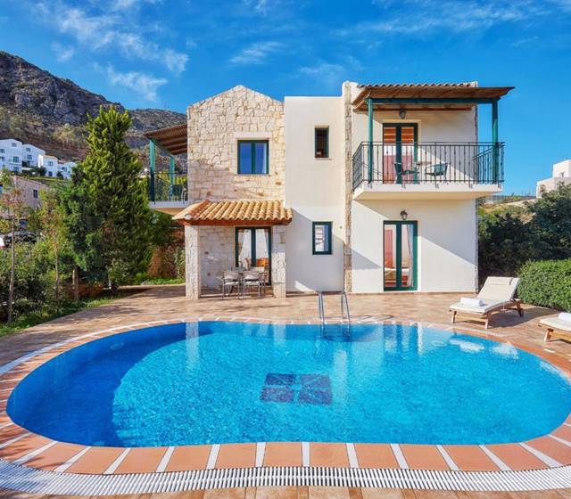 Marni Hotel Villa outdoor terrace with pool and sunbeds