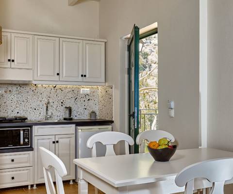 Marni Hotel Superior Suite modern kitchen with dining area