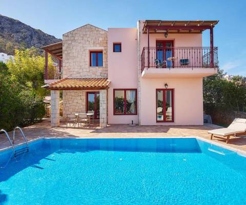 Marni Hotel Villa outdoor view from the pool area with sunbeds