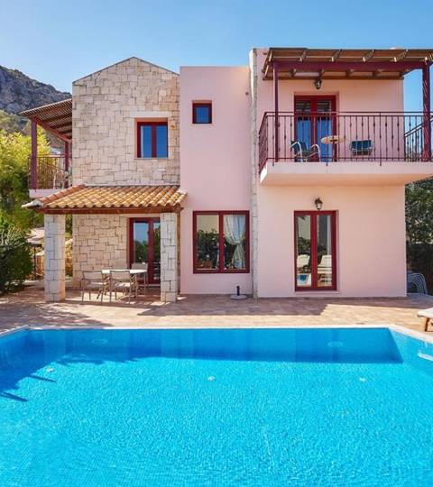 Marni Hotel Villa outdoor view from the pool area with sunbeds